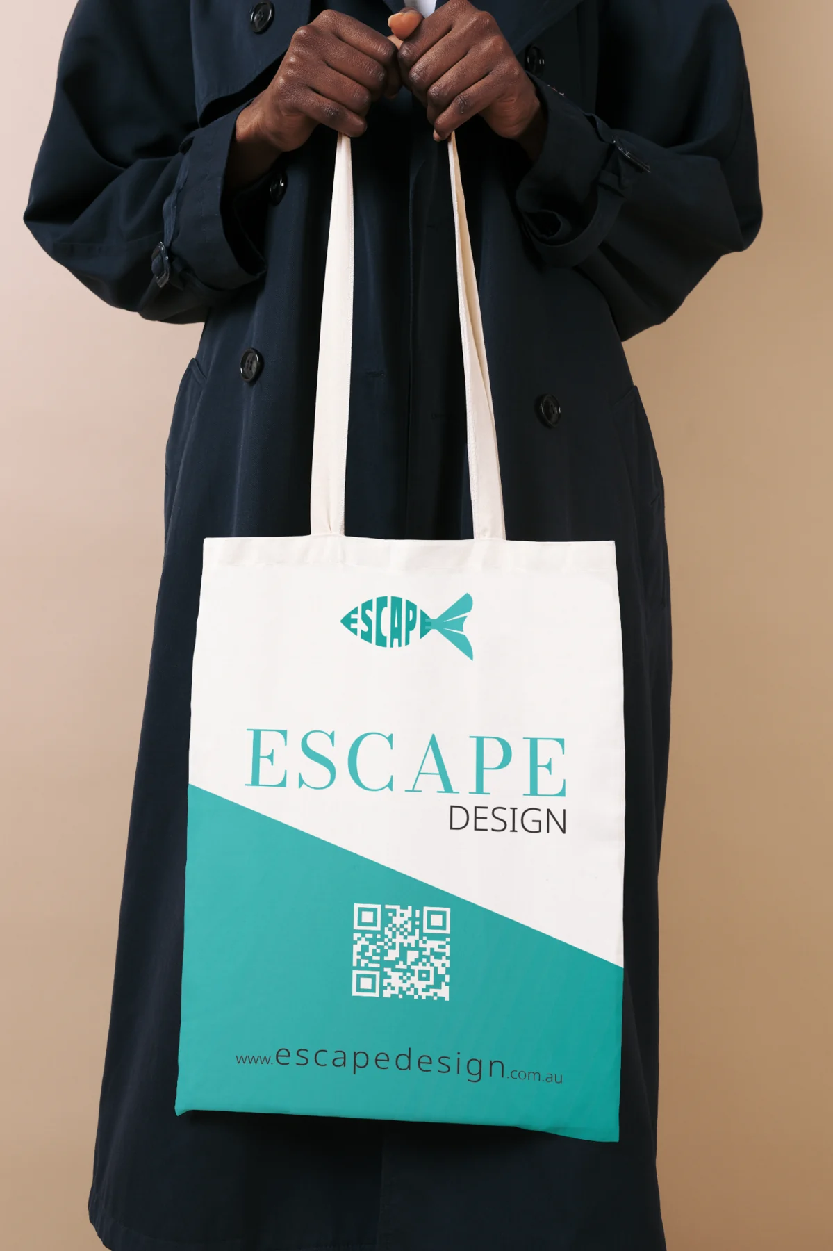 Escape Design identity applied to a branded tote bag